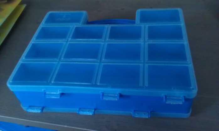A box with loads of compartments to store the buttons