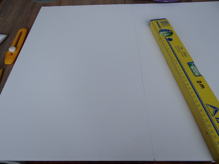 First, I divided the foamboard in two fitting pieces